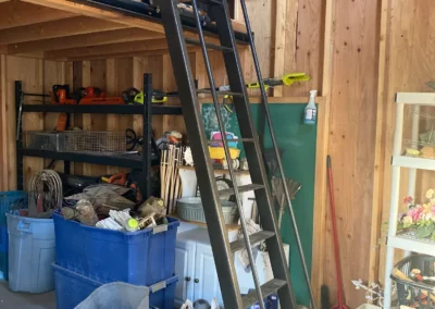 Custom steel rolling loft ladder fabricated and installed by Johnson Iron, Truckee CA