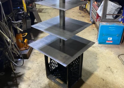 Custom fabricated steel tiered display stand by Johnson Iron, Truckee CA